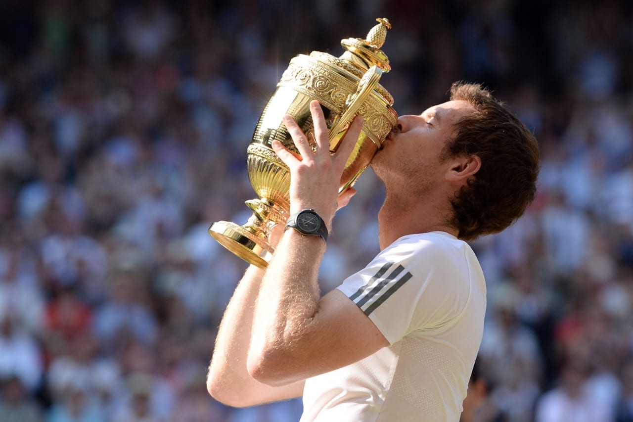 Andy Murray hoisting Wimbledon trophy wearing Rado Hyperchrome XXL