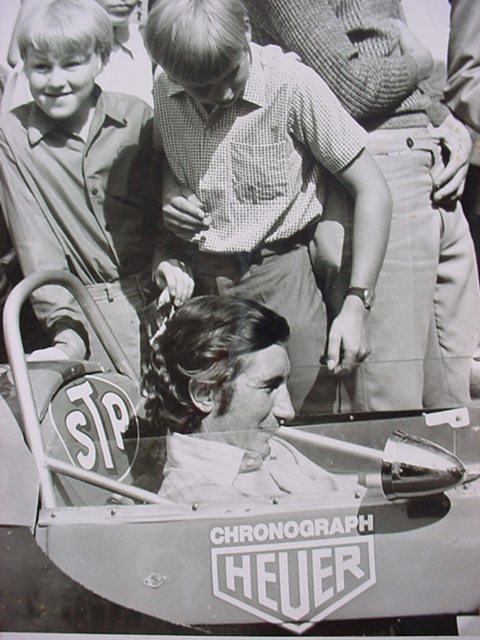 Jo Siffert in his car with a Heuer sticker.