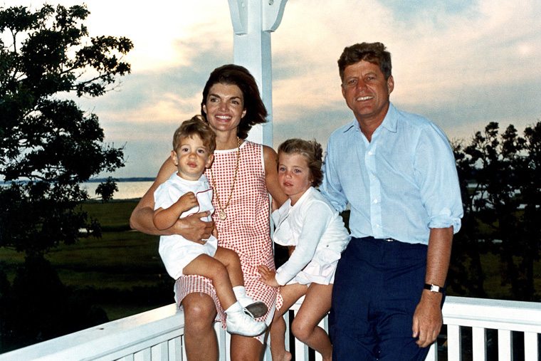 JFK and family in 1962. JFK is pictured with his Cartier Tank.