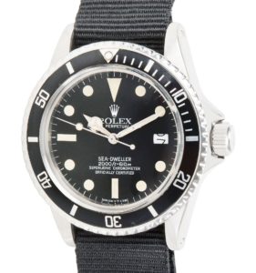 A picture of a Rolex Sea-dweller with a black dial and a black strap 