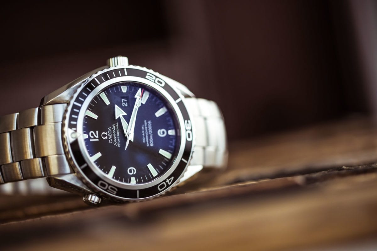 OMEGA Seamaster vs. Rolex Submariner - Crown & Caliber Blog