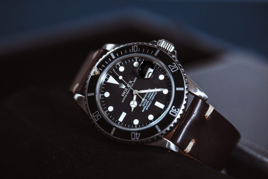 The iconic Rolex Submariner in black with mercedes hands 