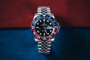 Rolex GMT Master II 126710 "Pepsi" on a blue and red background