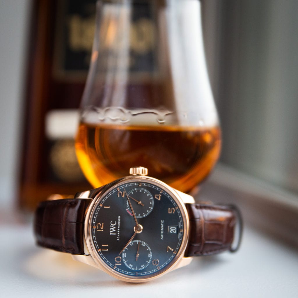Rose Gold watch with whiskey